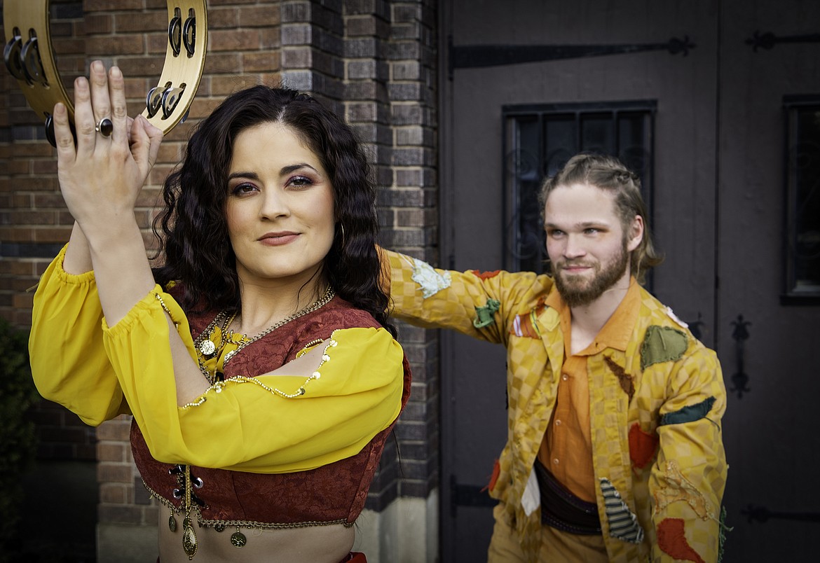 Marlee Andrews as Esmeralda shakes a tambourine while Zach Johnston as Clopin Trouillefou admires her beauty. 
(Photo by PRESERVATION PHOTOGRAPHY)