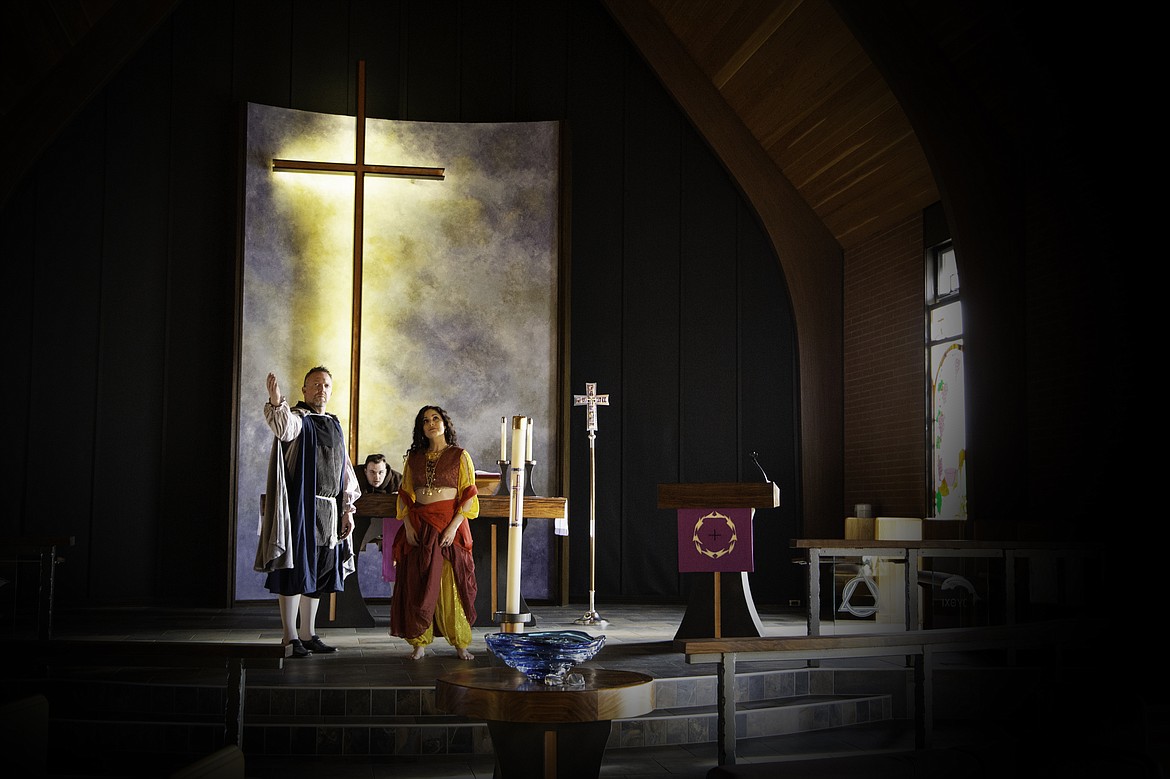 Photo by PRESERVATION PHOTOGRAPHY
Frollo (Greg Washington) and Esmeralda (Marlee Andrews) play out a scene as Quasimodo (Conner Ealy) lingers in the background.