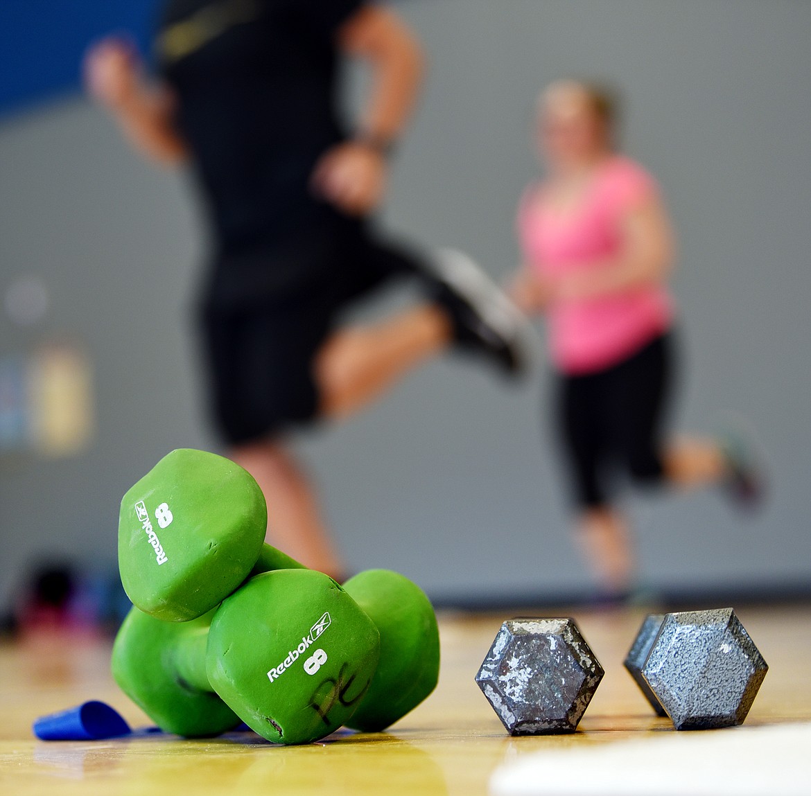 Tara Measure&#146;s fitness class begins with warm-ups, stretches, aerobics and weights on Monday, April 9 at West Valley School. The program is free to the public. (Brenda Ahearn/Daily Inter Lake)