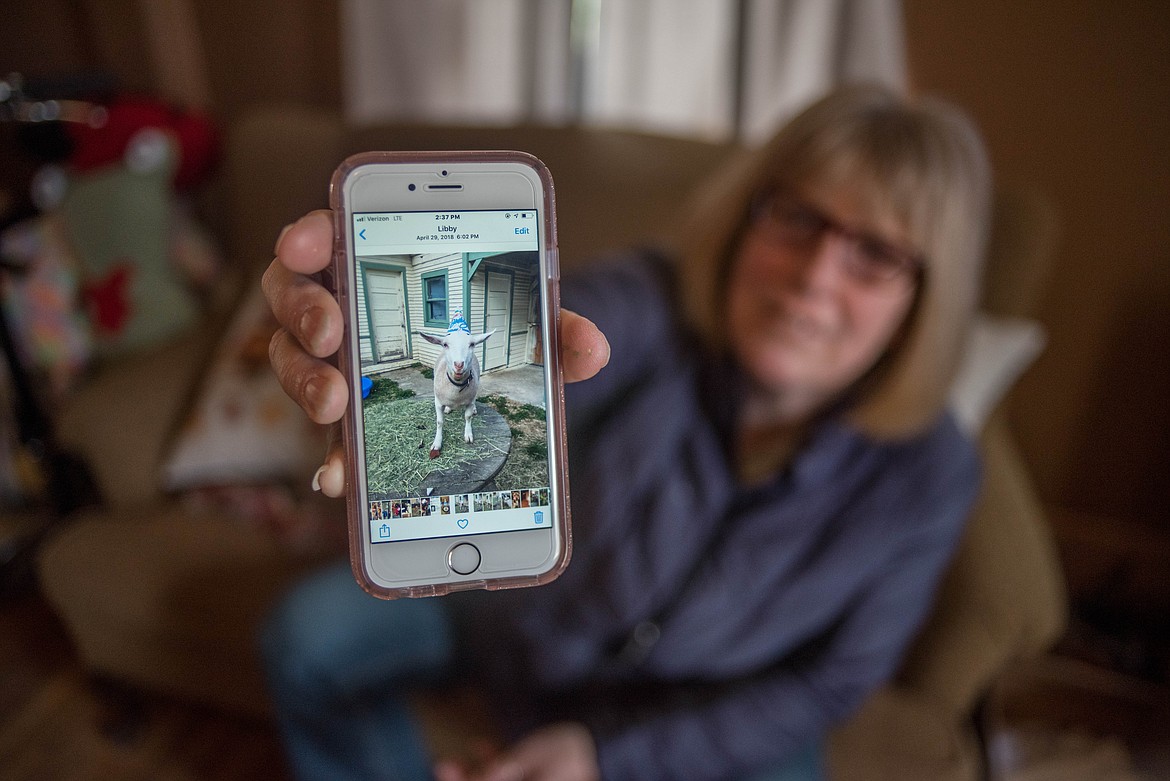 &#147;We always keep up on pictures,&#148; said Janice Bailey while scrolling through photos on her phone. (Luke Hollister/The Western News)