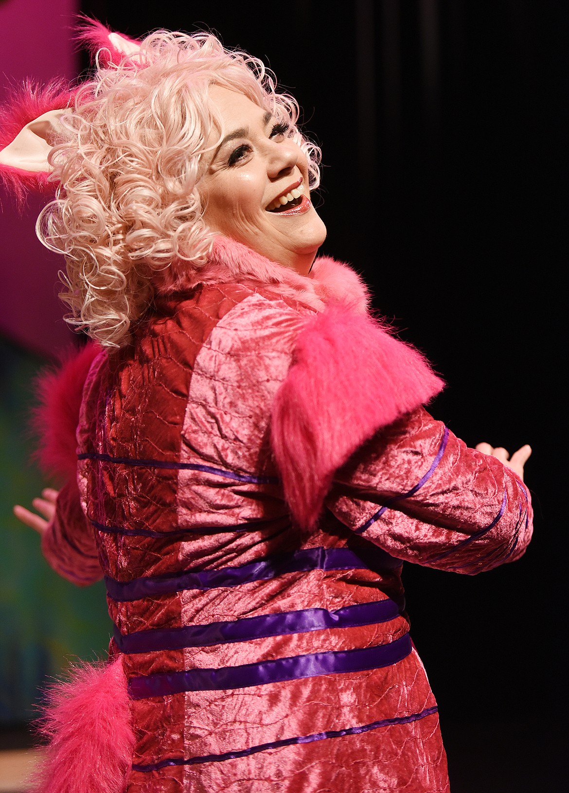 A sly smile from Scarlett Schindler as the Cheshire Cat in the dress rehearsal for &#147;Alice in Wonderland.&#148;