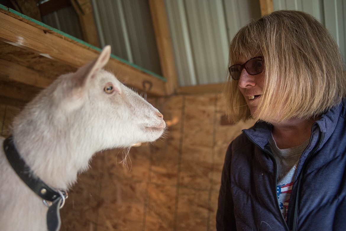 Cinnamon, left, hangs out on top of her wooden spool with her owner, Janice Bailey. &#147;I know she listens to me,&#148; said Bailey. Inside Cinnamon&#146;s room is a stuffed animal, hay and a heated lamp to keep warm. (Luke Hollister/The Western News)