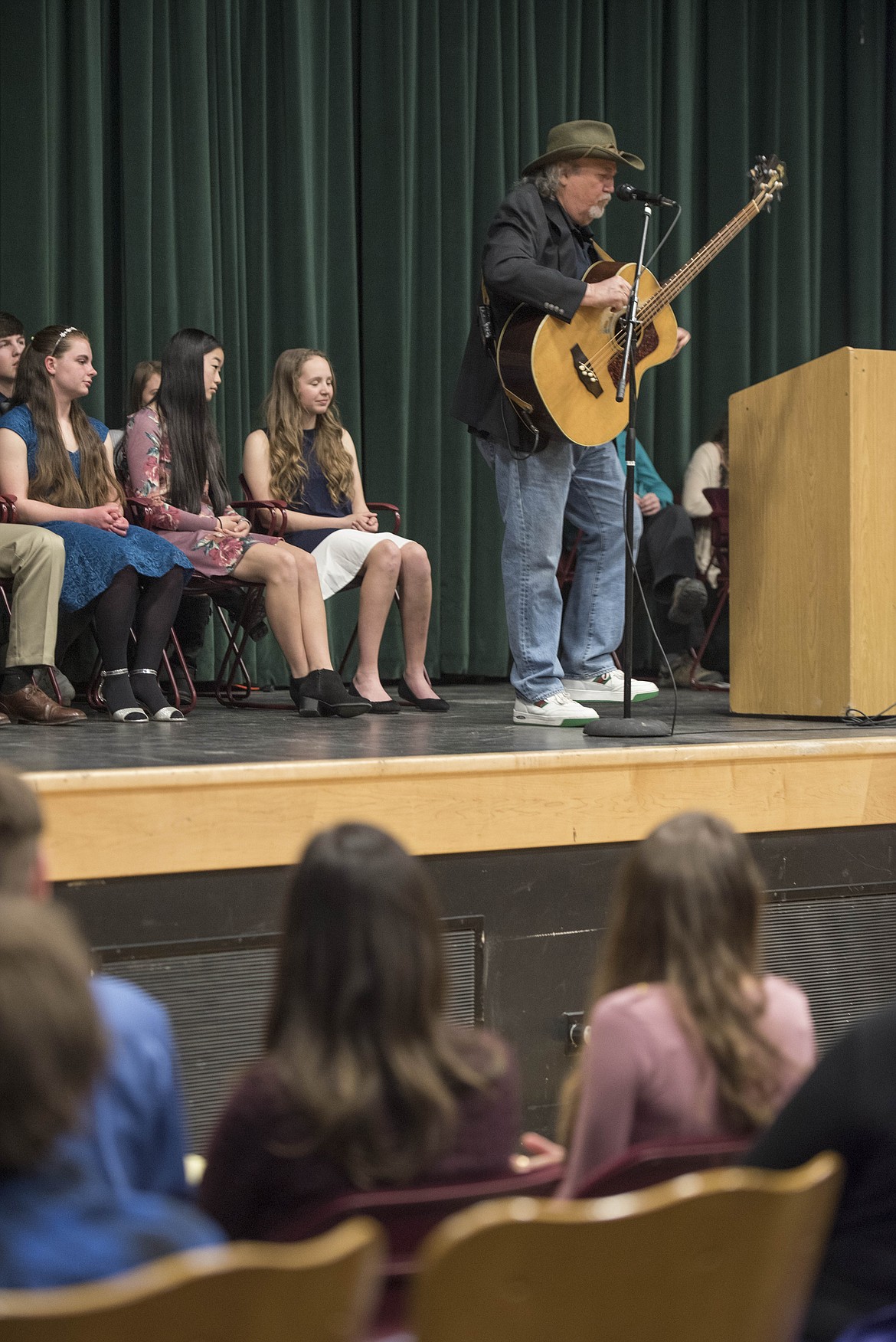 Steve Riddle talked about his travels and love for Libby followed by a song about a cowboy who gave away his horse -- somposed by Dick Riddle for his off-Broadway musical &#147;Cowboy&#148; --  at the National Honor Society induction ceremony, April 8 at the Libby Memorial Events Center.