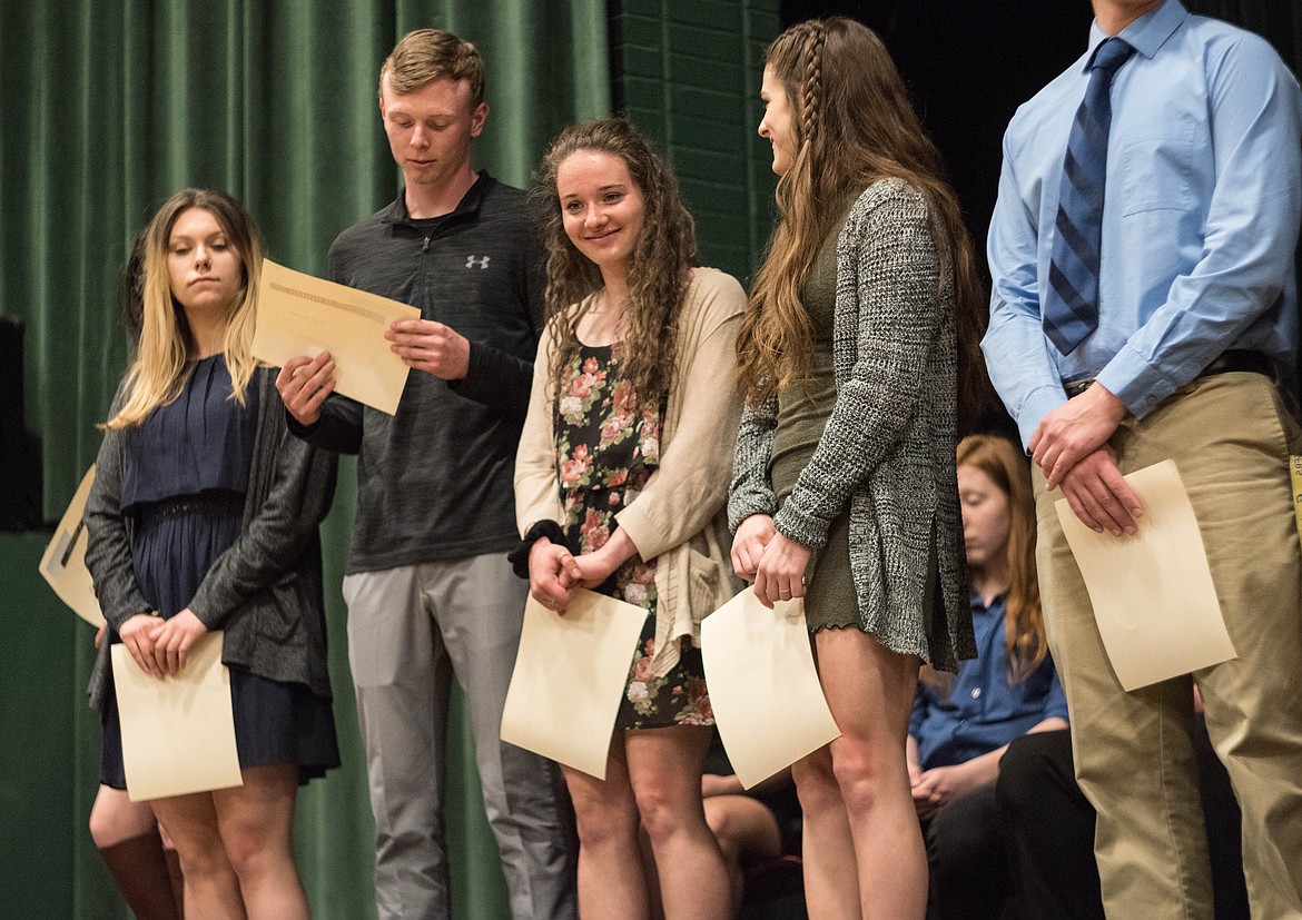 Senior members of the National Honor Society received certificates of recognition at the National Honor Society induction ceremony, April 8 at the Libby Memorial Events Center.