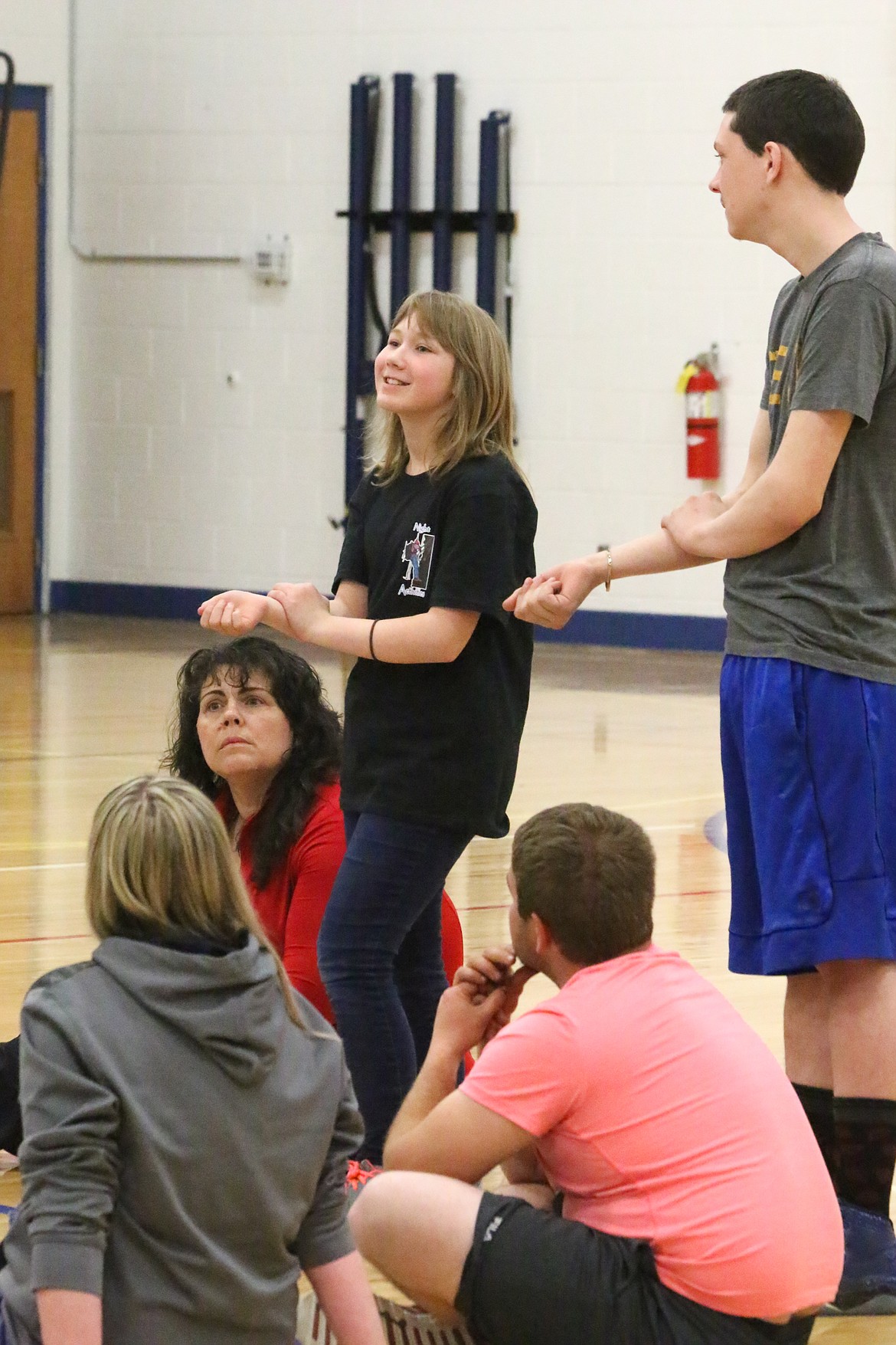 Photo by MANDI BATEMAN
Ilena Wenzel and Jacob Herman showing where to check for circulation as part of learning the ABC&#146;s of first aid.