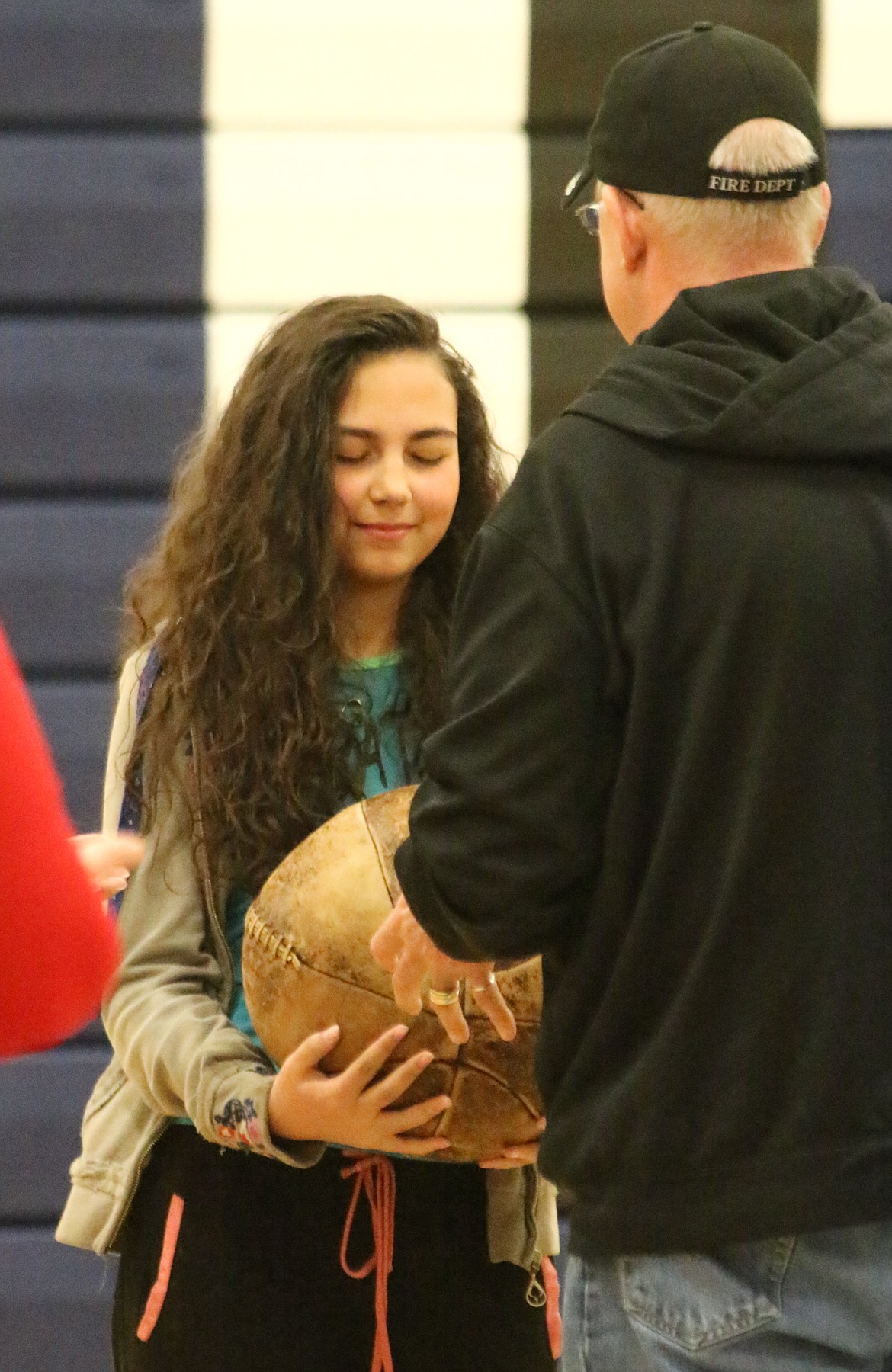 Photo by MANDI BATEMAN
Robert B. Wenzel, M.A. LCPC starts the game by handing Eloisa Gurino a medicine ball.