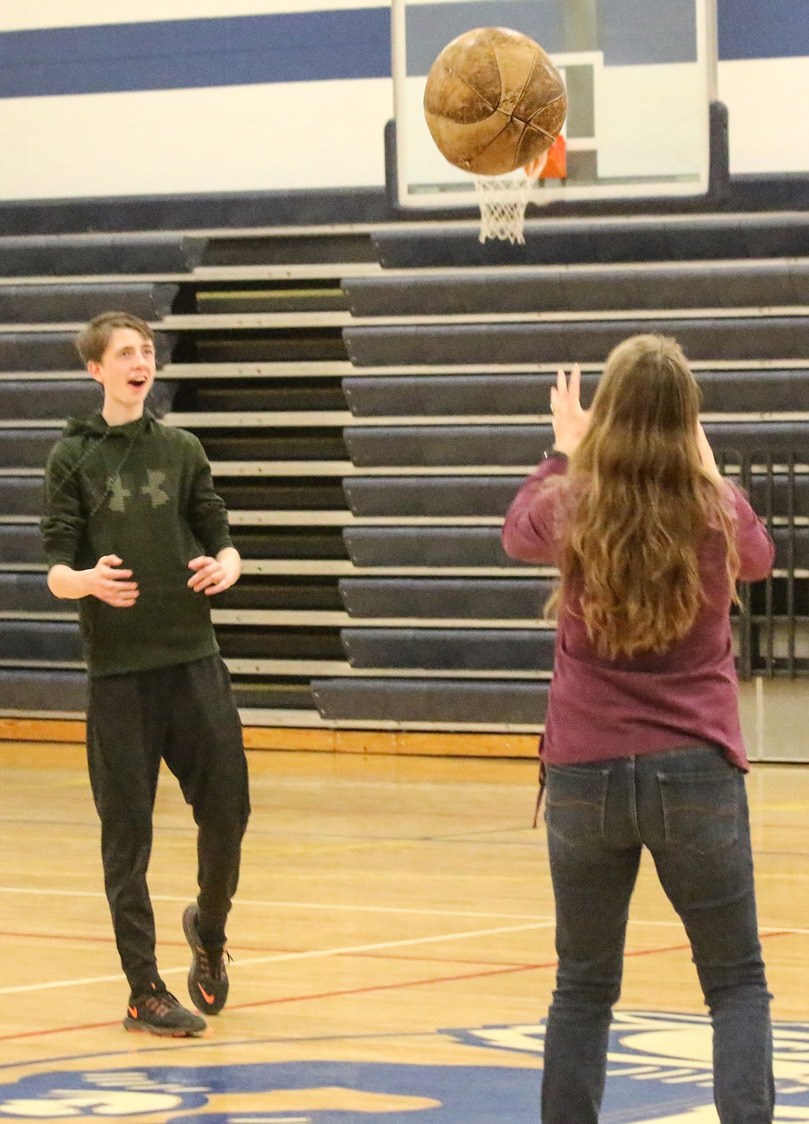 Photo by MANDI BATEMAN
Adam Matyr throwing the medicine ball to parent, Valerie Strugar.