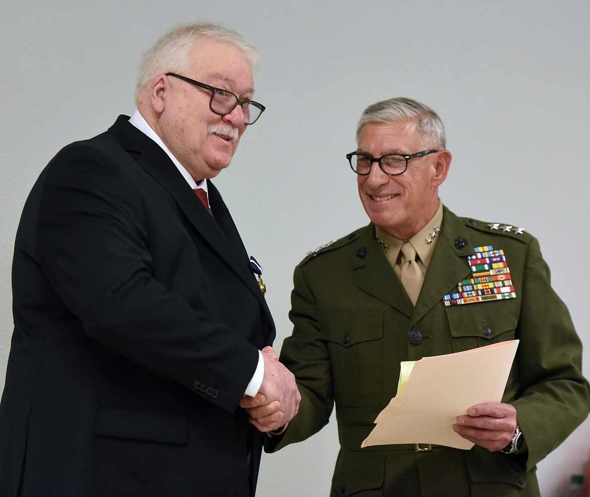 JAMES H. STOGNER, who served in the U.S. Marine Corps during the Vietnam War, received the prestigious Navy Cross Medal during a special ceremony Friday afternoon, April 5 at the VFW in Polson. The presentation was made by retired U.S Marine Corps Lt. General Frank Libutti. (Joe Sova/Clark Fork Valley Press)