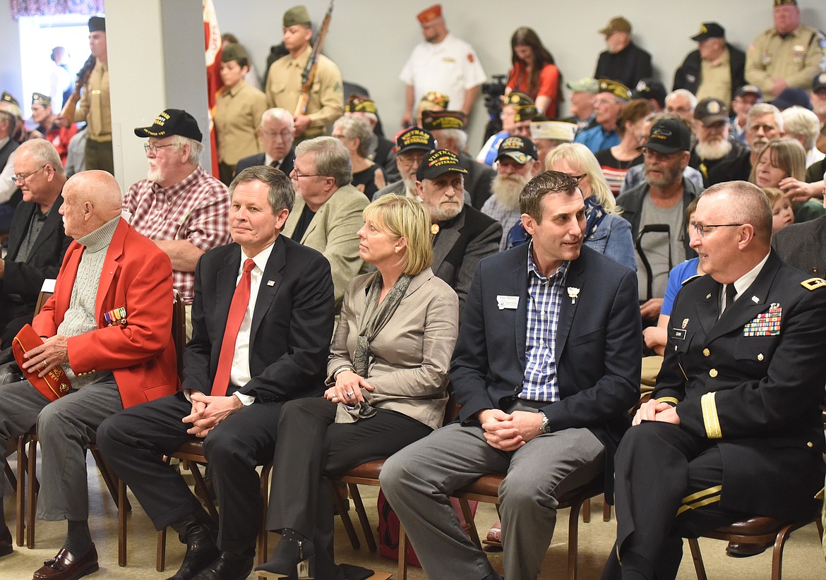 SEN. STEVE Daines, second from left in the front row in the photo, was largely responsible for U.S. Marines Corporal James H. Stogner receiving the Navy Cross Medal at a ceremony Friday, April 5 at the Polson VFW. The meeting room was filled with supporters of Stogner and the military in general. (Joe Sova/Lake County Leader)