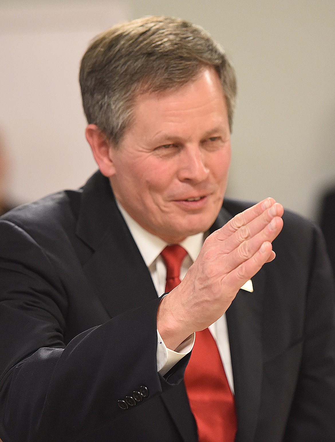 U.S. SEN. Steve Daines salutes Marine Lieutenant General Frank Libutti after being recognized for helping facilitate James Stogner receipt of the Navy Cross Medal.