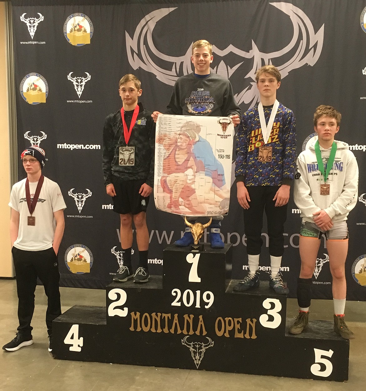 TRAE THILMONY of Thompson Falls holds the 116-pound bracket for the 15- to 16-year-old division that he won at the Montana Open wrestling tournament at MetraPark in Billings. Thilmony posted a 5-0 record to finish first among 36 wrestlers in his bracket. (Photos courtesy of Mike Thilmony)