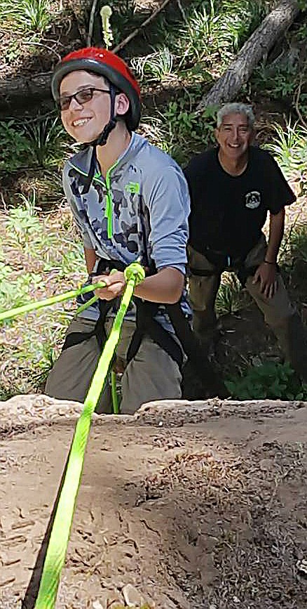 ANGELO ALDERETTI encourages a Project ASCENT camper to trust his equipment and his climbing partners.
(Carolyn Hidy photos/Clark Fork Valley Press)