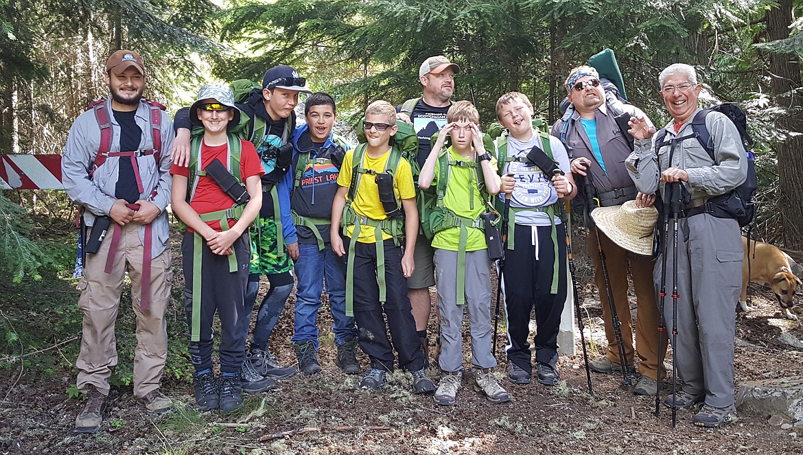 CAMPERS IN the Bull River Camp head out from the Rock Lake Trailhead during Project ASCENT activities.