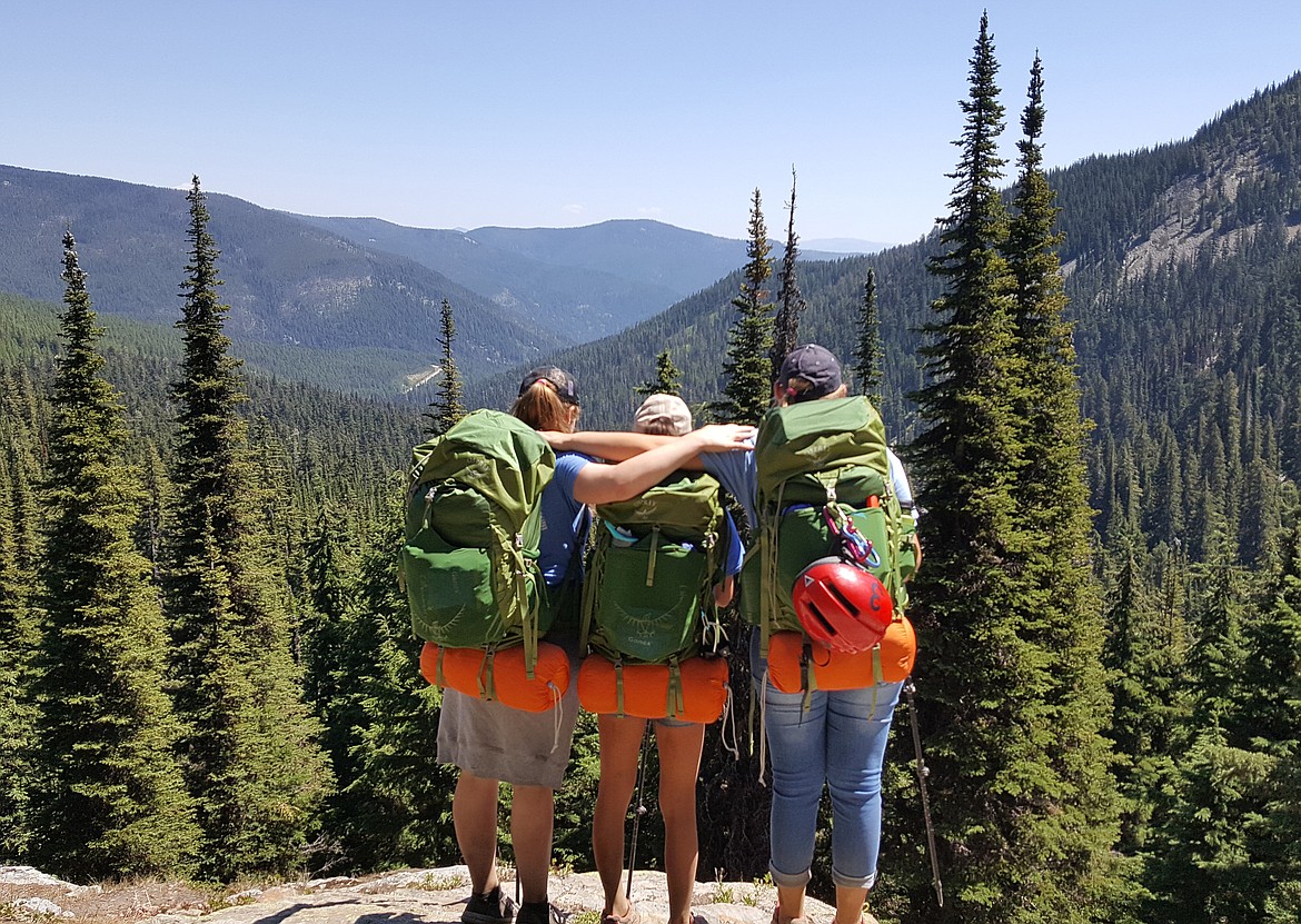 ABBY LANE, Julissa Bonney and Daniel Van Huss earned this view over the headwaters of Prospect Creek with a hard hike during Project ASCENT activties in mountainous Montana.