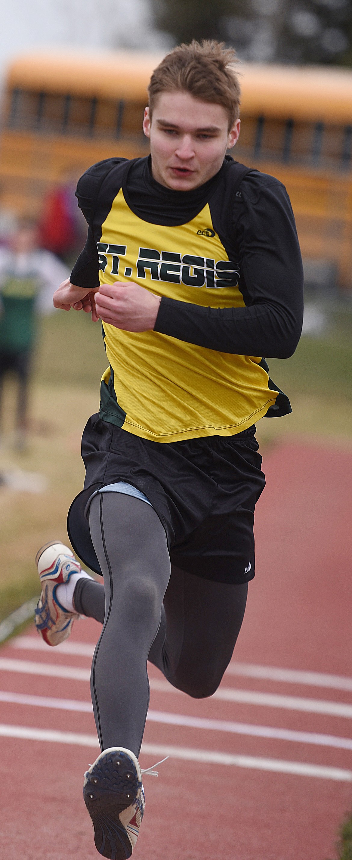 ST. REGIS Tiger Ian Ferris completes his hop, skip and jump down the runway during the triple jump at the Frenchtown Invitational at Big Sky High School last Saturday to open the track and field season. (Joe Sova/Mineral Independent)