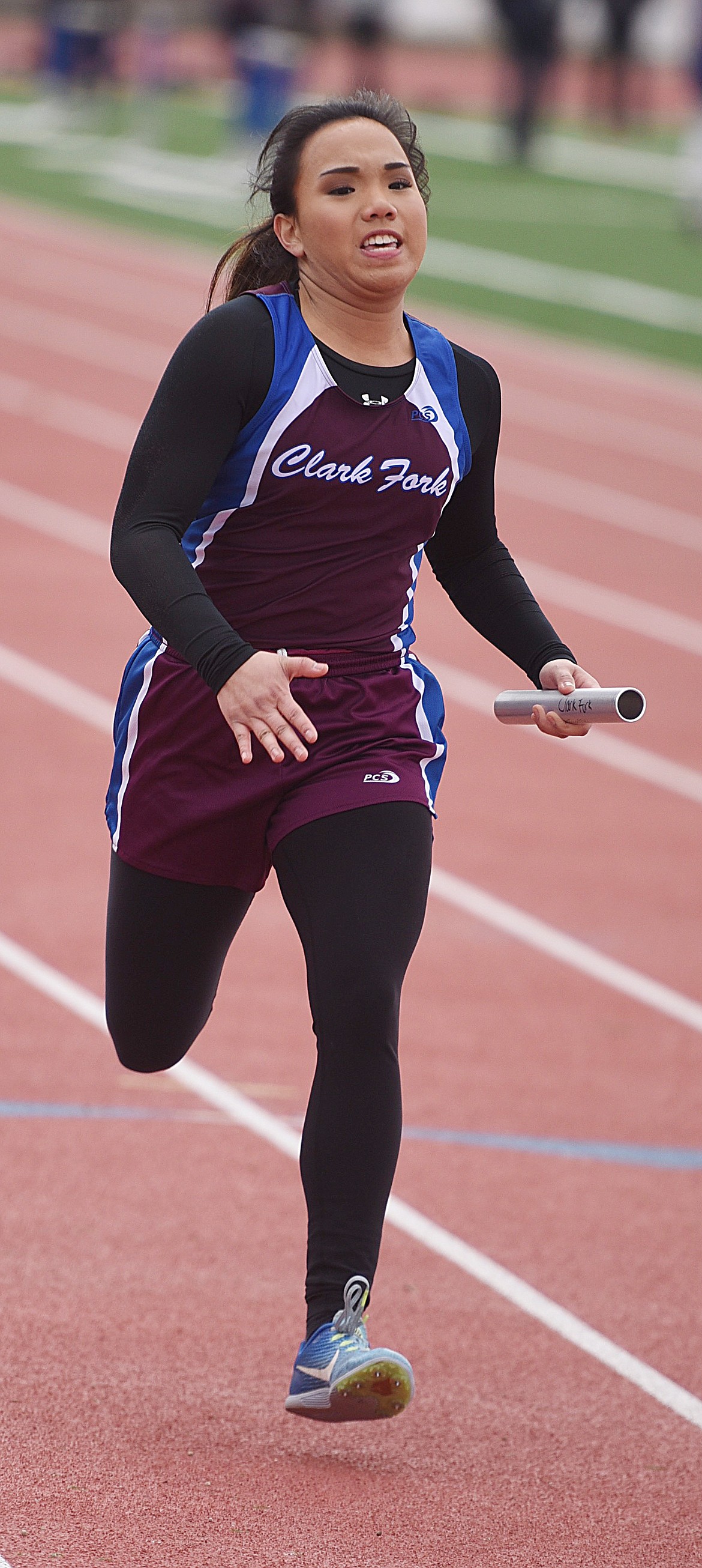 SOPHIA KRUTILLA churns down the home stretch while running the anchor leg of the 4x100 relay at the Frenchtown Invitational in Missoula. (Joe Sova/Mineral Independent)