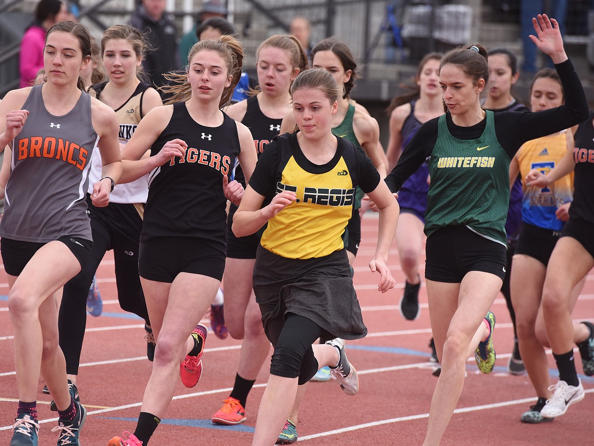 MADISON KELLY of St. Regis competes against a pack of runners early in the 1,600-meter run at the Frenchtown Invitational Track Meet at Big Sky High School in Missoula on Saturday, April 6. (Joe Sova/Mineral Independent)
