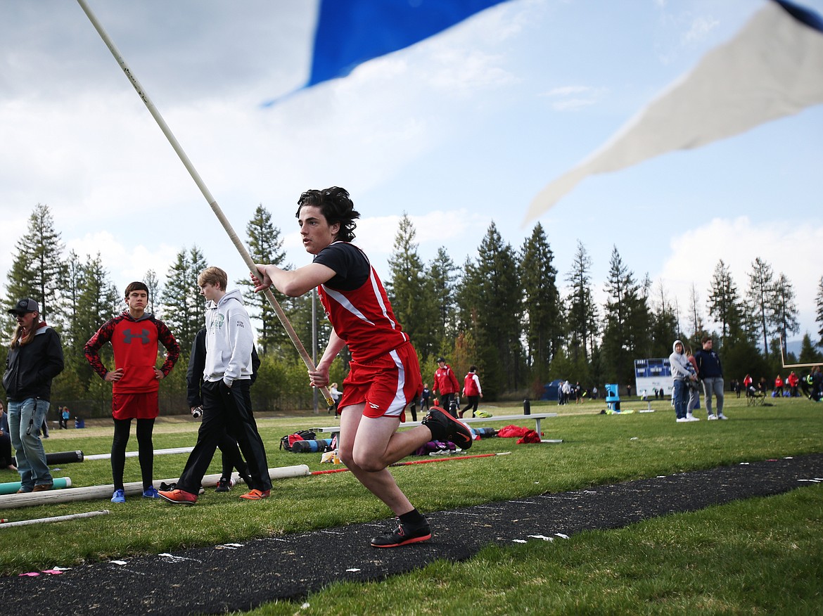Sam Becker of Sandpoint High School competes in the pole vault at Friday&#146;s Timberlake Invitational.