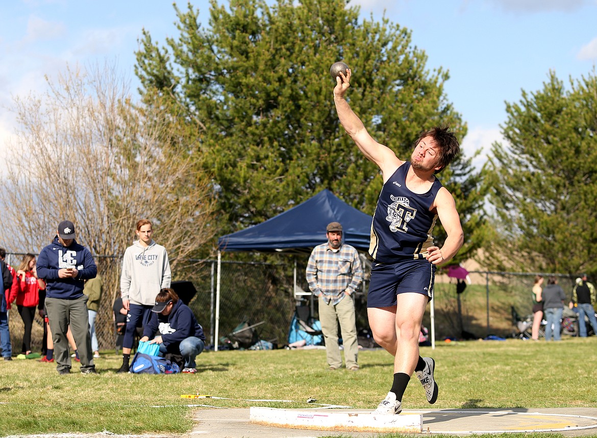 Jeremy Macklemore of Timberlake High School throws a distance of 44 feet and 1 1/2 inch in the shot put at Friday&#146;s Timberlake Invitational. (LOREN BENOIT/Press)
