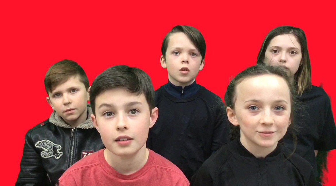 Fifth-graders of Sorensen Magnet School of the Arts and Humanities pose for a shot during the filming of the student-made movie &quot;Rhythm of the Drum,&quot; which was accepted by the Idaho Screendance Festival. Back row, from left: Niko Lucky, Orion Burns and Ari Vanway. Front row, from left: Benjamin Mello, Olivia May. (Courtesy photo)