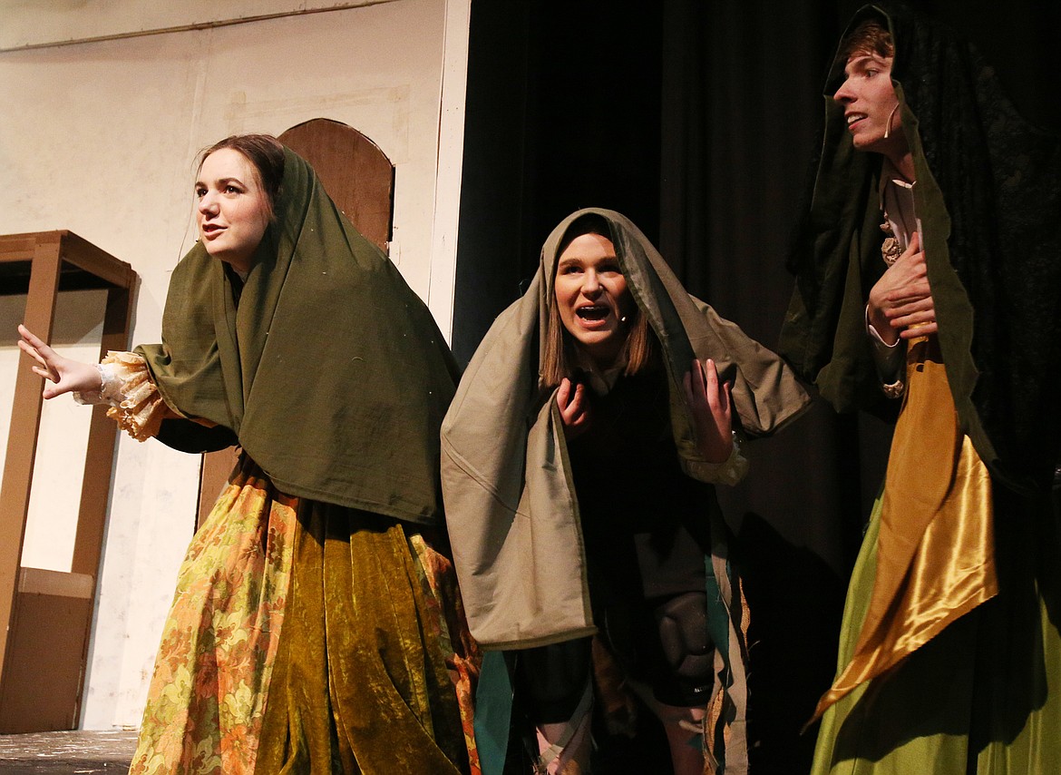 The three stepmothers, from left, Alyssa Yustat, Holly Rod and Malachi Dodson, rehearse a scene for Lake City&#146;s production of &#147;Once Upon a Forest&#148; Tuesday night at the school auditorium. The play begins tonight and runs through next week at the high school.