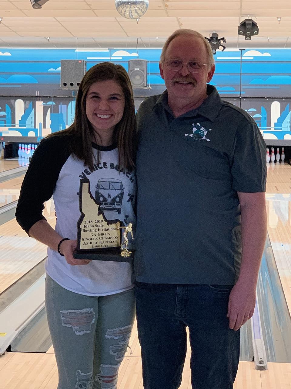 Courtesy photo
Ashley Kaufman, left, of Lake City qualified for state all four years of high school placing second her freshman year, third her sophomore year, second her junior year, and now first her senior year. At right is LCHS coach Ron Jacobson.