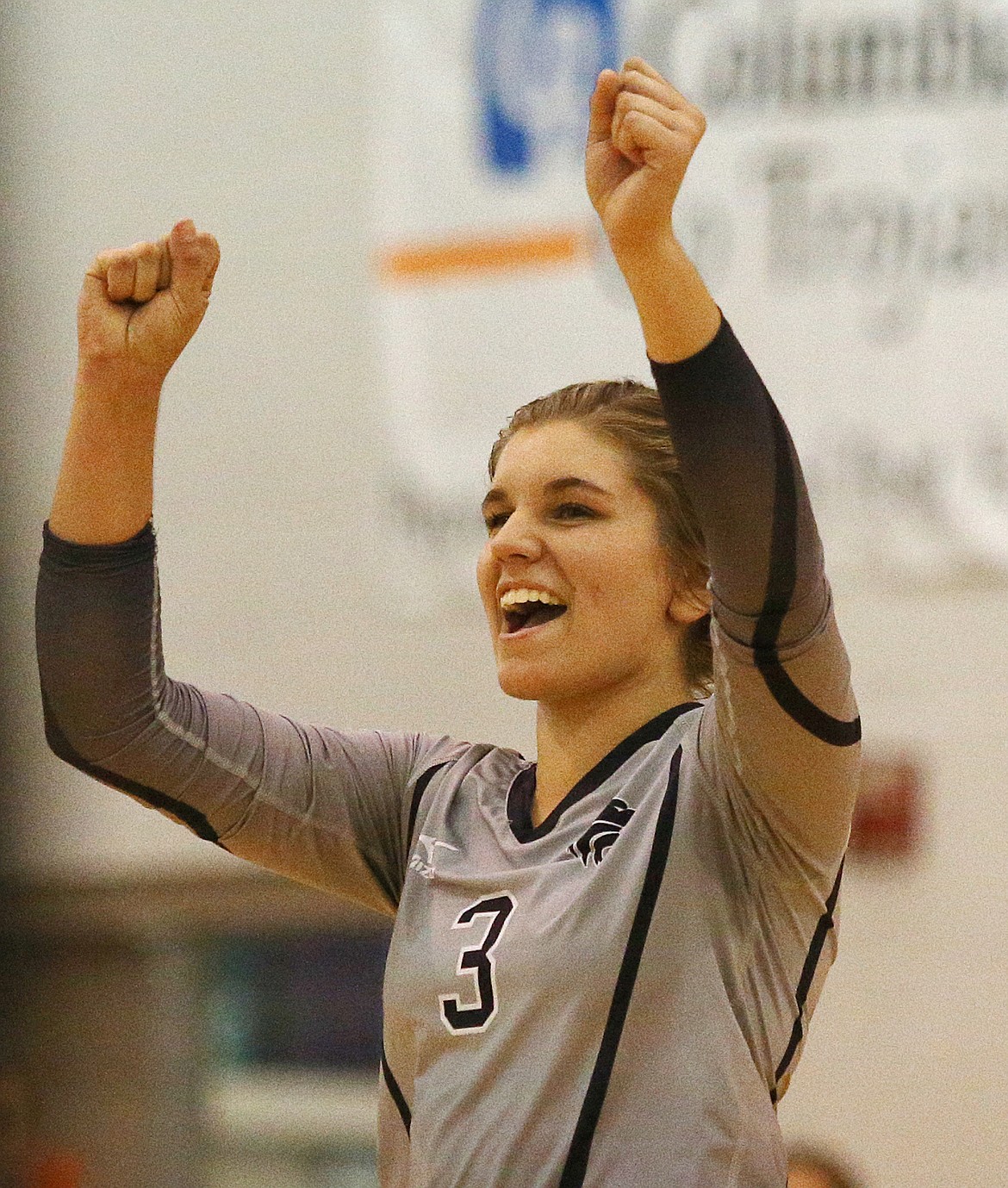 Ashley Kaufman of Lake City High celebrate a point during Thursday night&#146;s match against Post Falls. (LOREN BENOIT/Press)