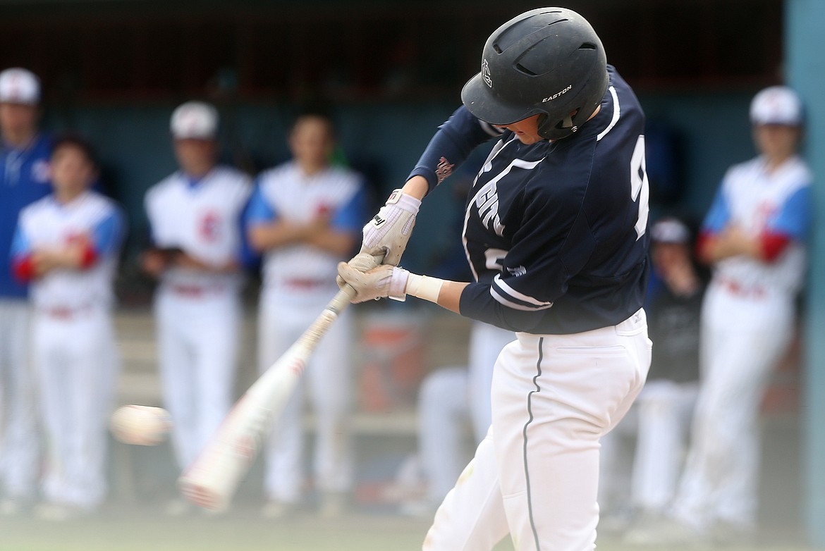 Lake City&#146;s Jackson Sherr makes contact on a pitch in Tuesday&#146;s game against Coeur d&#146;Alene. (LOREN BENOIT/Press)