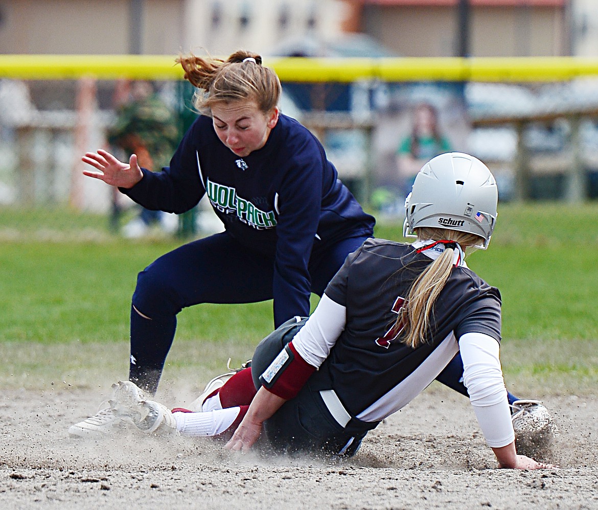 Glacier shortstop Jennifer Wallace gets the tag down in time to catch Helena&#146;s Brooke Ark attempting to steal second at Glacier High School on Saturday. (Casey Kreider/Daily Inter Lake)