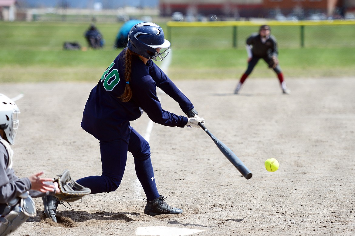 Glacier&#146;s Sammie Labrum connects on a pitch in the sixth inning against Helena at Glacier High School on Saturday. (Casey Kreider/Daily Inter Lake)