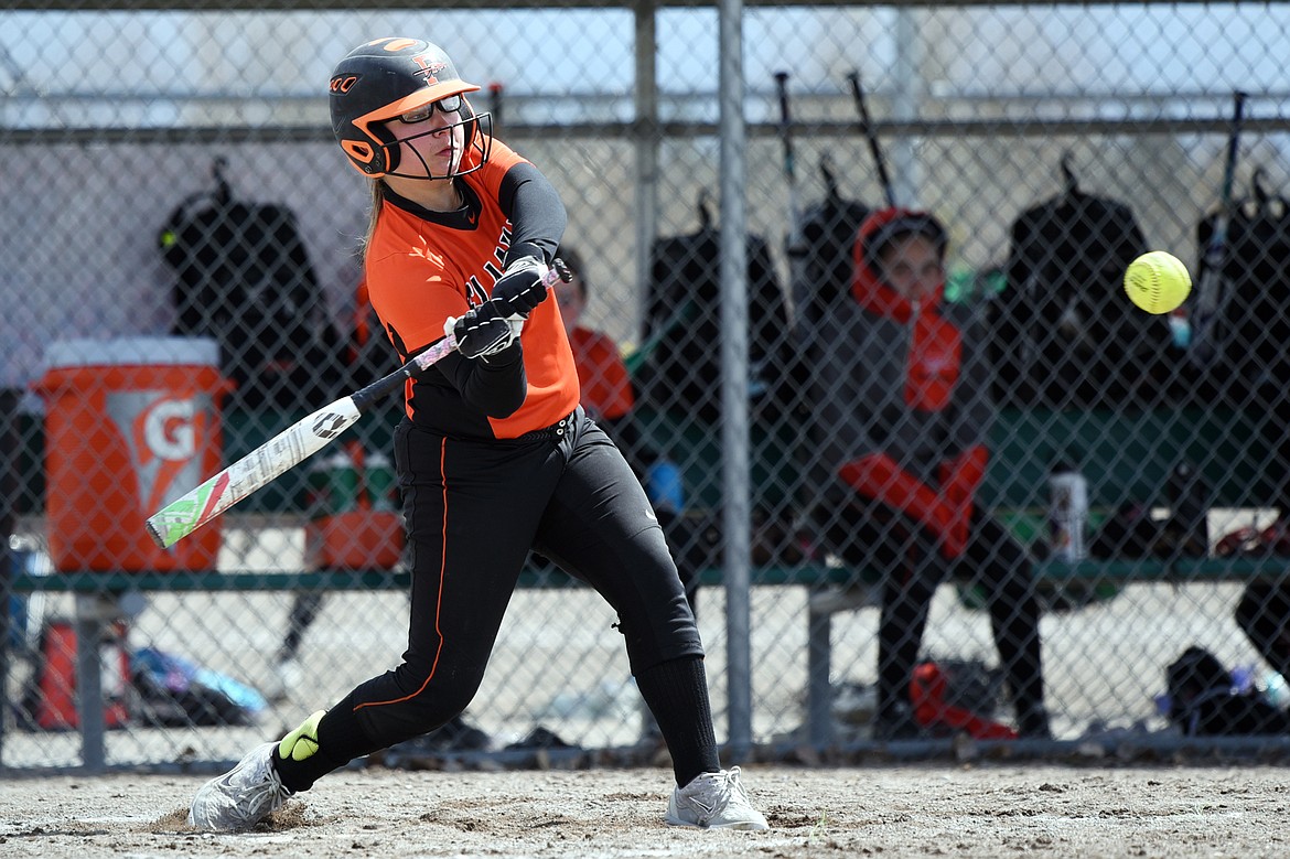Flathead&#146;s Sydney Olson (11) swings away in the fourth inning against Helena Capital at Kidsports Complex on Saturday. (Casey Kreider/Daily Inter Lake)