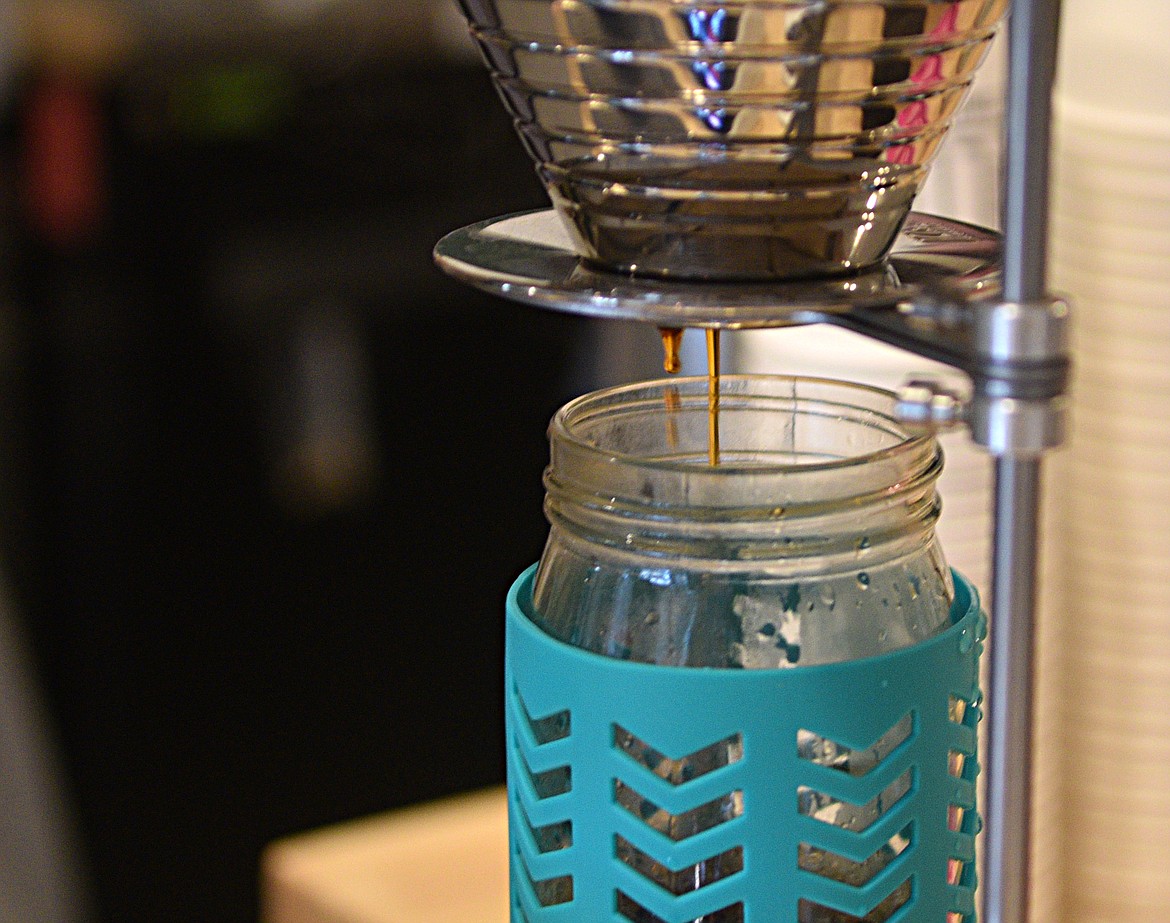 Coffee drips from the pour over coffee machine at Wild Coffee Company. The shop recently opened on Central Avenue. (Heidi Desch/Whitefish Pilot)