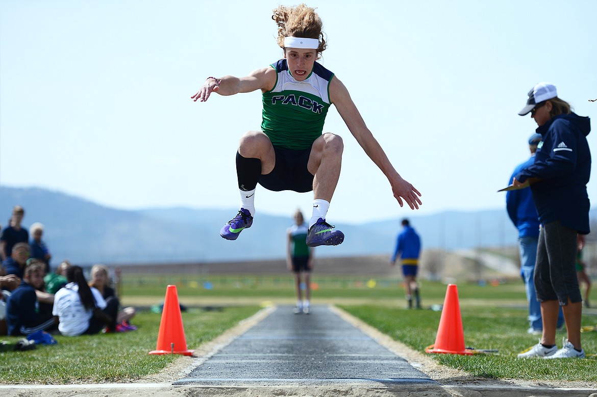 Glacier's Dyllyn Stabler competes in the long jump at the Glacier Cinco track meet at Glacier High School on Thursday. (Casey Kreider/Daily Inter Lake)