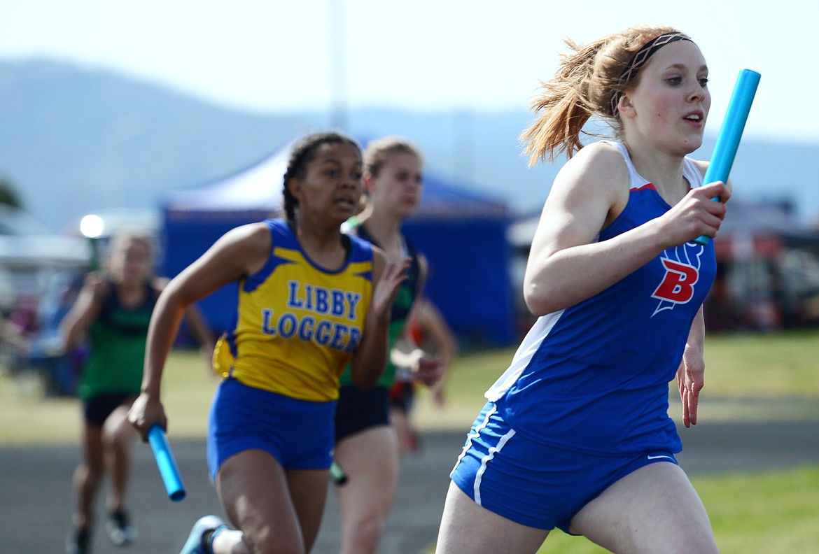 Bigfork's Alaura Zarn runs the first leg of the girls 400 meter relay at a track meet at Glacier High School on Thursday. (Casey Kreider/Daily Inter Lake)