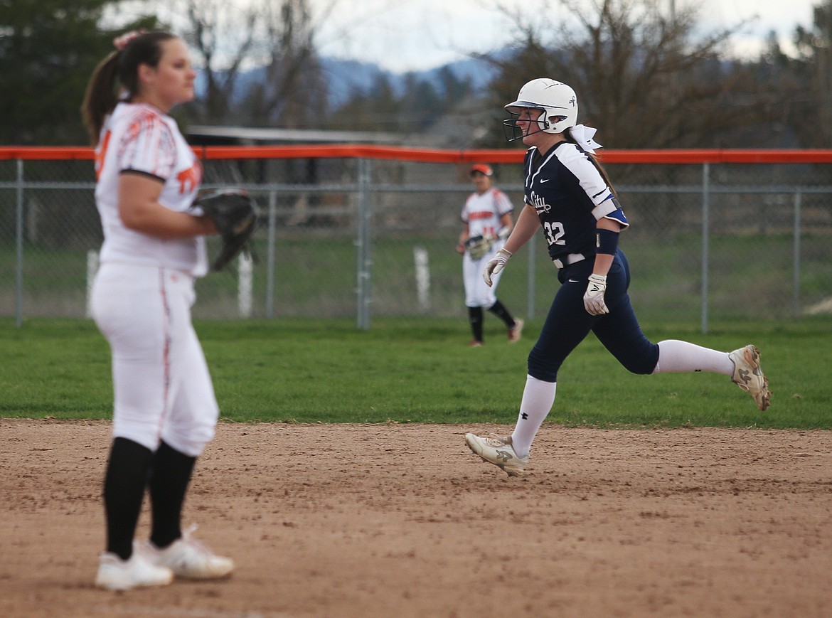 Lake City&#146;s Lacey Lemburg rounds second base on her way to home plate after hitting a solo home run against Post Falls last Tuesday.