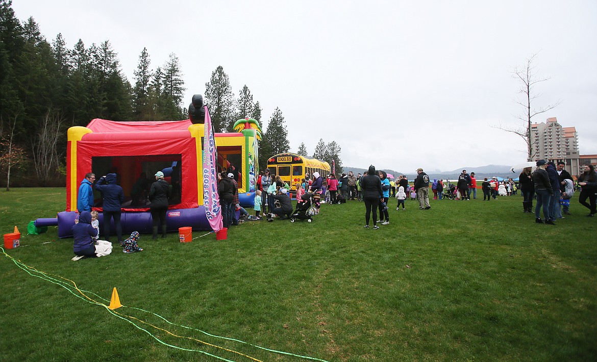 Games, bouncy houses and prizes added to the fun of the Real Life Ministries Easter Egg Hunt in McEuen Park on Saturday. (DEVIN WEEKS/Press)