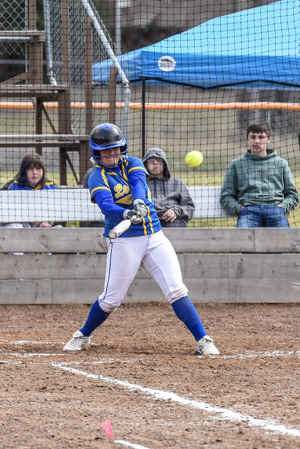 Libby senior Emily Carvey hits a homerun, bottom of the fourth, Saturday at home against Ronan. (Ben Kibbey/The Western News)