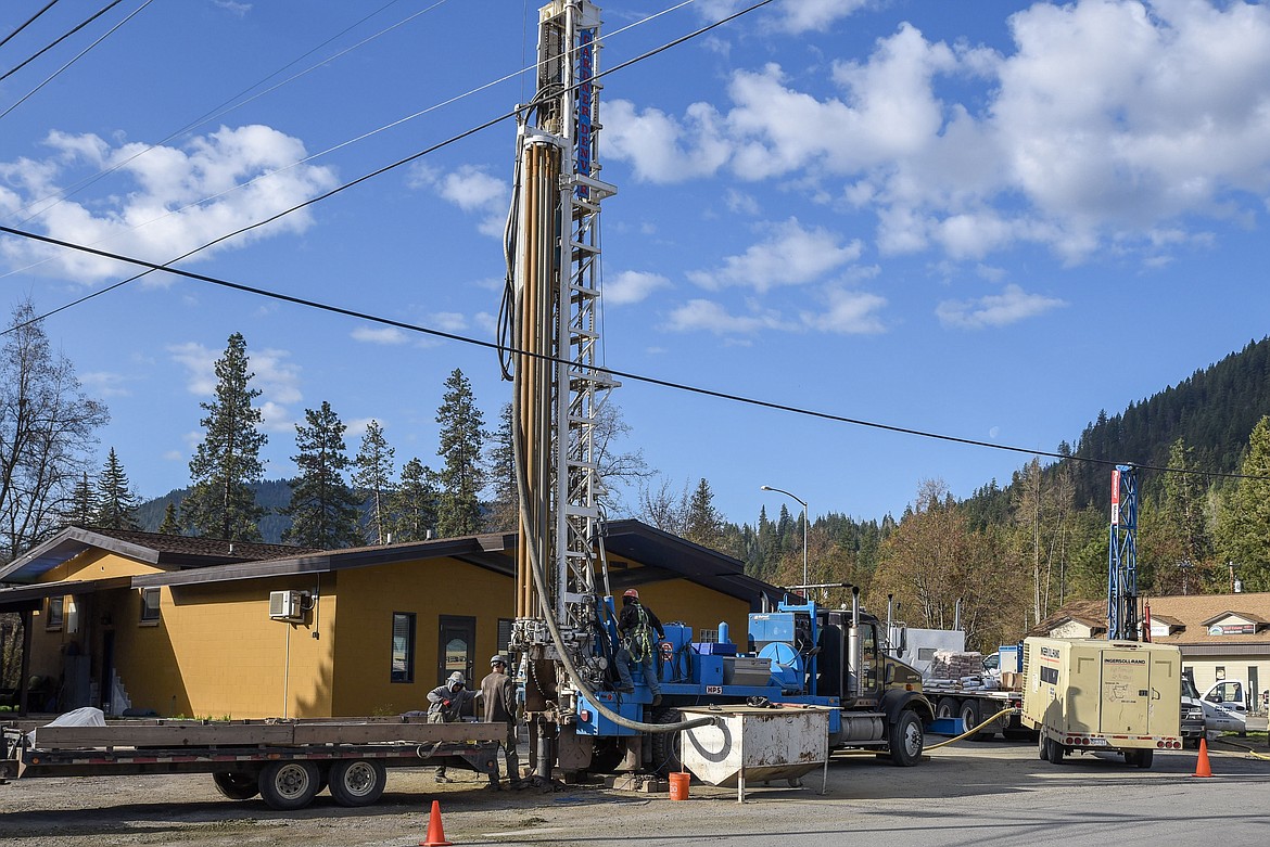 Workers operated drilling rigs at the former Troy Service Station site at Missoula Avenue and 3rd Street in Troy, Wednesday morning. (Ben Kibbey/The Western News).