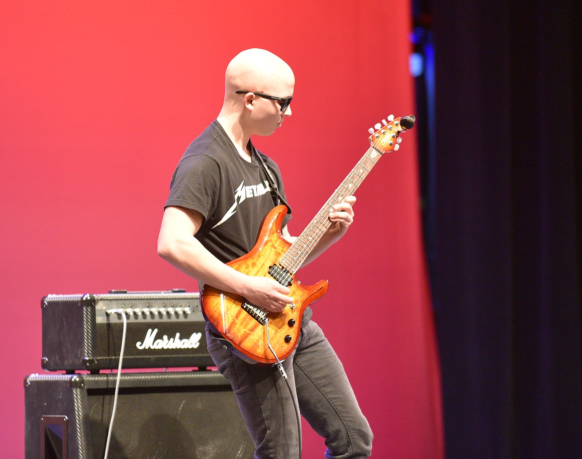 Bain Black plays a guitar solo during the Whitefish High School Talent Show last week at the Performing Arts Center. (Heidi Desch/Whitefish Pilot)