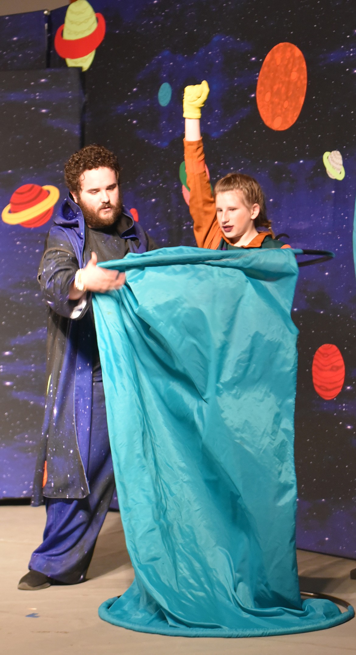 &#147;TRANSPORT &shy;&#151; ENERGIZE!&#148; Gulliver (Mikiah Cook) makes one of many attempts to transport home, assisted by &#147;Invisible Force,&#148; played by Austin Sultzbach. (Carolyn Hidy photos/Clark Fork Valley Press)