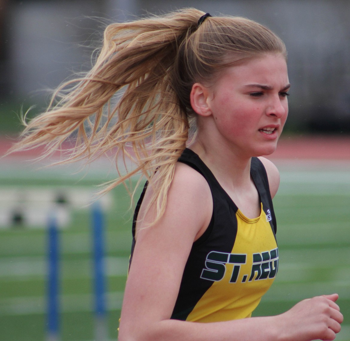 SUNNY SHOUPE of St. Regis runs the 200-meter dash at the Seeley-Swan Invite at Big Sky High School in Missoula on Saturday, April 20.