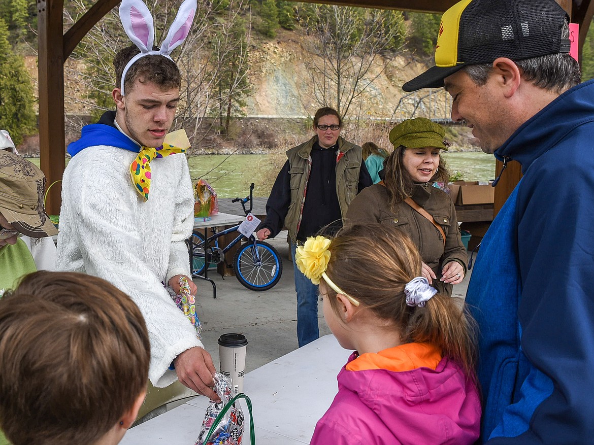 A couple easter bunnies from Troy High School were on hand to help hand out the prizes from the Easter egg hunt at Roosevelt Park in Troy Saturday. (Ben Kibbey/The Western News)
