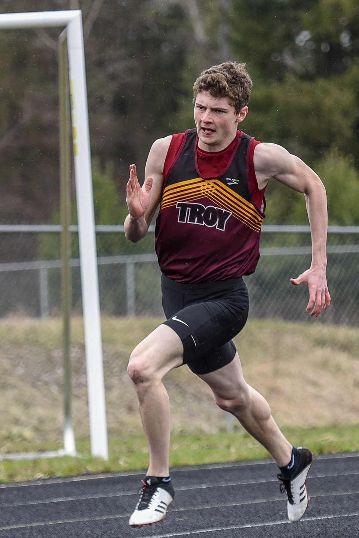 Troy senior Hunter Leighty leads the field early in the 400m dash at the Libby Invitational April 13. Only a week later, on April 20 at the Seeley-Swan Invitational, Leighty would become the fastest high schooler in the state in the 400, with a time of 50.5 seconds. (Ben Kibbey/The Western News)