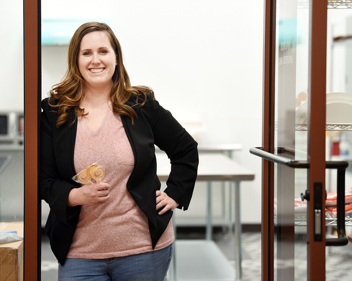 Portrait of Stephanie Murray at her new Fiddlestix Candy Co. in Evergreen on Monday, April 1. The recipes she uses are her own amalgamation of ideas and recipes she found as she began to create the candies. One of the distinctive features of her pops is the use of Non-GMO Glucose syrup rather than high fructose corn syrup.(Brenda Ahearn/Daily Inter Lake)