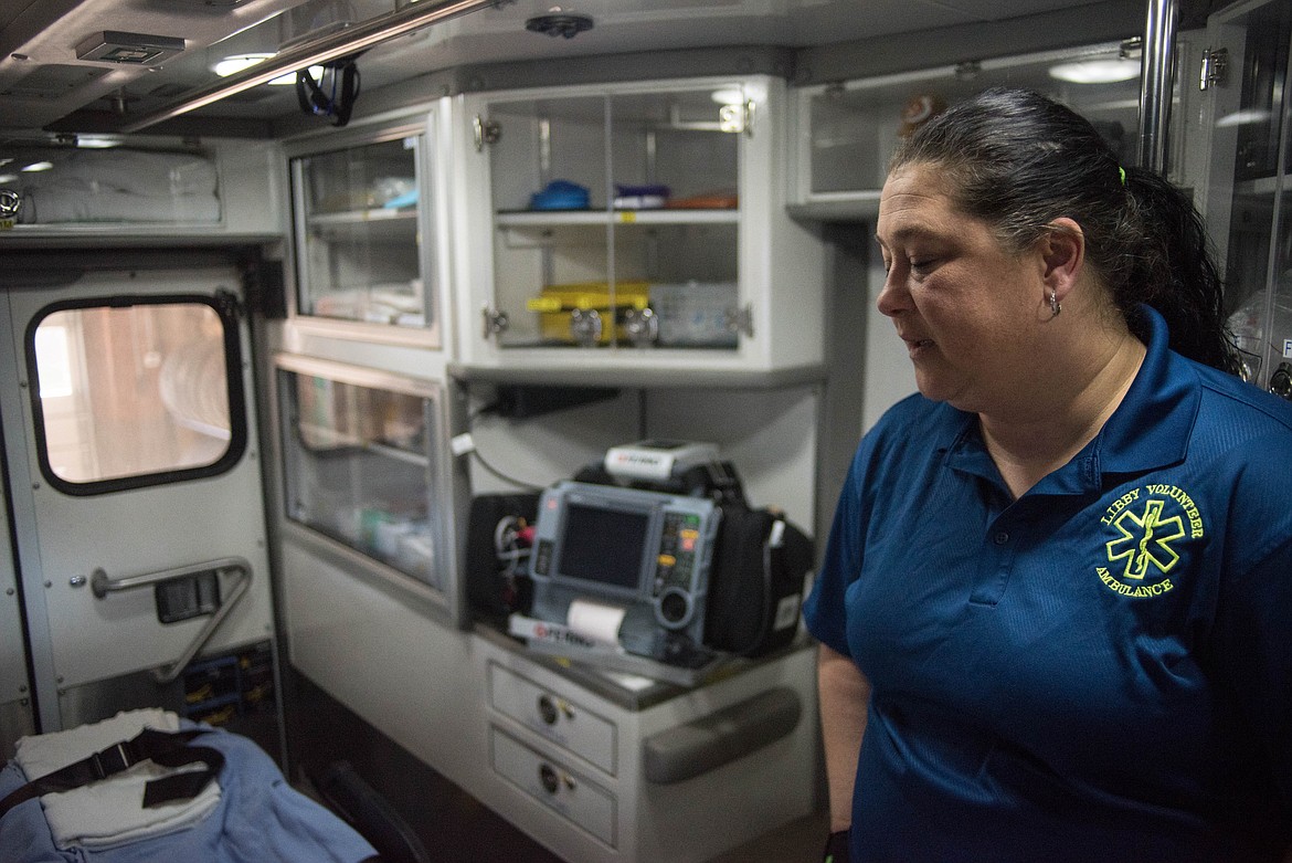 Amy Milde stands in the back of one of Libby&#146;s ambulances, Monday. Sometimes there is just one person driving and one in back, she said. (Luke Hollister/The Western News)