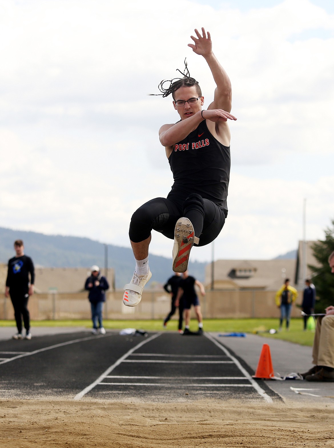 LOREN BENOIT/Press
Tyler Trengove of Post Falls High competes in the long jump at the District 1 All-Star Meet at Post Falls High School.