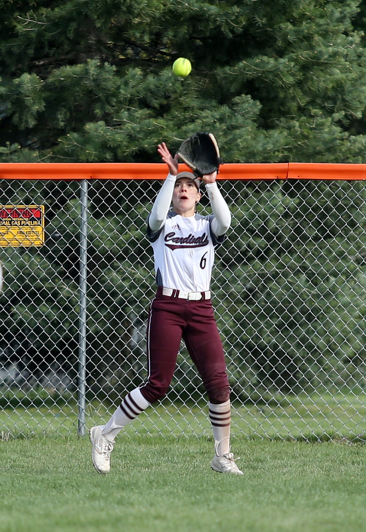 North Idaho College outfielder Jori Kerr catches a fly ball in a game against Community Colleges of Spokane.