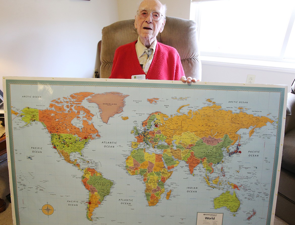 Noble Brewer worked for Western Airlines for 20 years and McDonnell Douglas for another 20, flying all around the world. The places he has visited are pinned on the map.(LOREN BENOIT/Press)