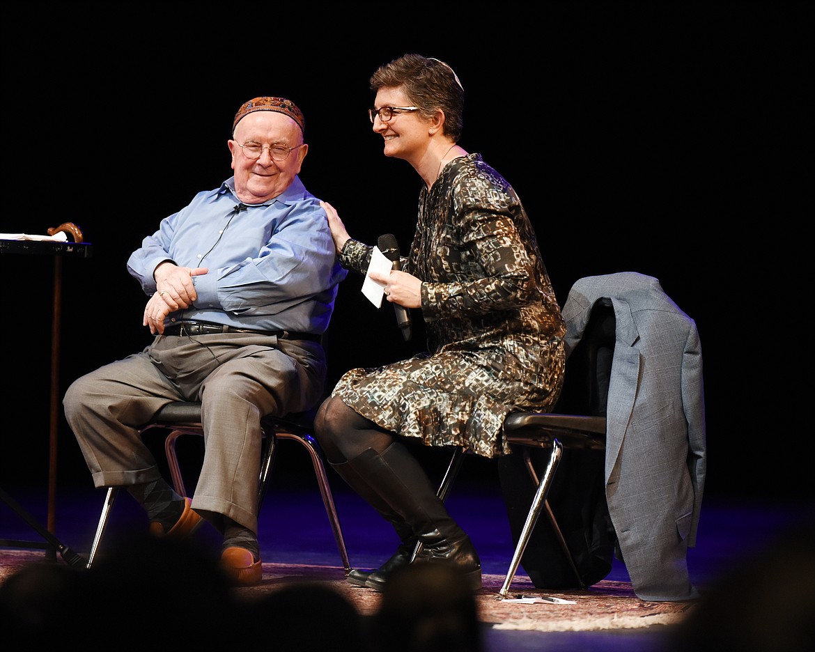 Holocaust survivor Judah Samet, left, is joined on stage by Rabbi Francine Roston on Monday evening, May 6, at the Whitefish Performing Arts Center. So many of Samet&#146;s statements are horrifyingly blunt. He does not mince his words:	&#151;&#160;&#147;We were reduced to one meal a day. The starvation had begun.&#148;	&#151; &#147;The buttons on the uniforms of the Gestapo were skulls, they indicated what they were &#151; they were killers.&#148;	&#151; At some of the death camps &#147;within 15 minutes of arrival you were coming out of the smoke stacks.&#148;	&#151; &#147;When you are starved almost to death modesty disappears, most desire disappeared, and we lost our sense of smell. The only smell I still remember is burning flesh &#151; that smell is so terrible you can&#146;t forget it. I know I can&#146;t. I think of it, and still smell it.&#148;(Brenda Ahearn/Daily Inter Lake)