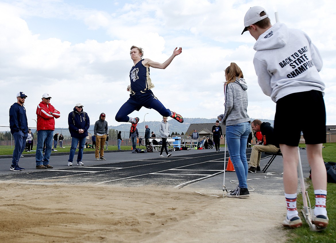 LOREN BENOIT/Press
Timberlake&#146;s Chase Gardom competes in the long jump at the District 1 Meet of Champions on Thursday at Post Falls High School.